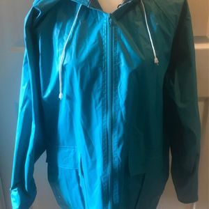Women’s Misty Harbor turquoise rain jacket size large
